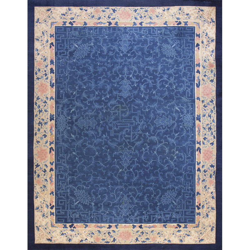 Tapis ivoire antique en laine bleu