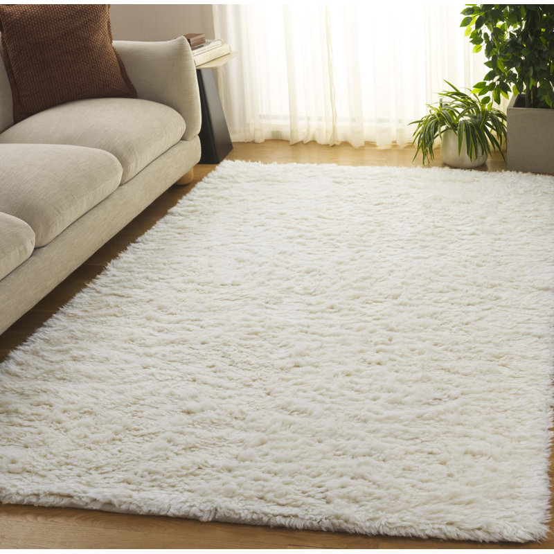 Abriel Solid Color Handmade Wool Area Rug in Ivory, Rectangle 5' x 8'