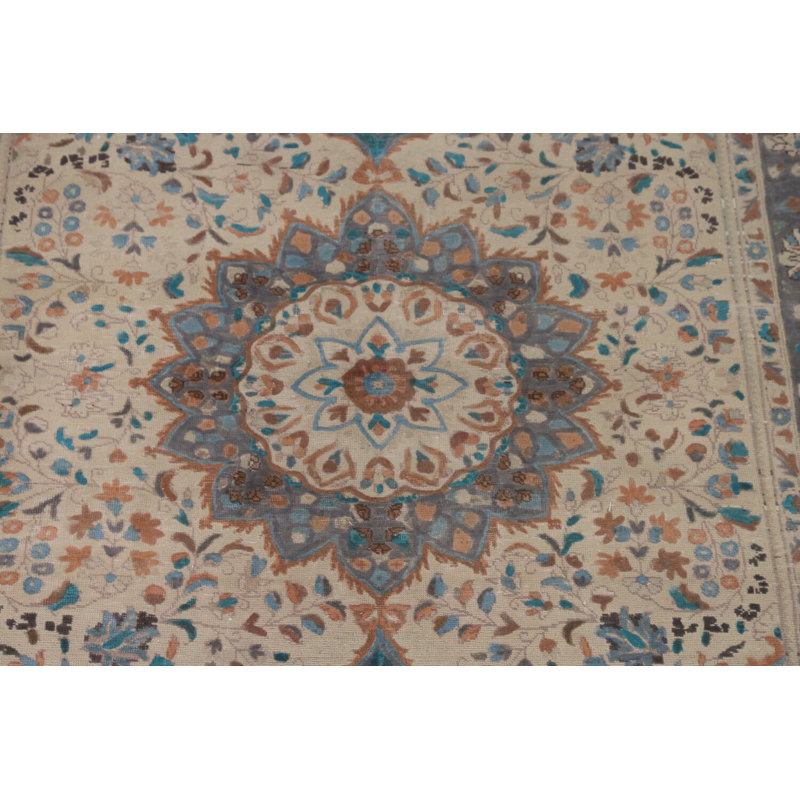 Tapis traditionnel ivoire en laine à motif floral 6 x 10