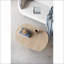 Table basse ovale crème moderne pour le salon, surface décorative polyvalente, surface spacieuse