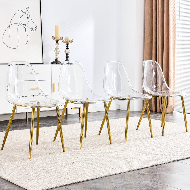 Ensemble de 4 chaises de salle à manger transparentes - Pieds en métal doré, siège confortable, support pour animaux de compagnie, design moderne et élégant, structure simple en plastique, ergonomie