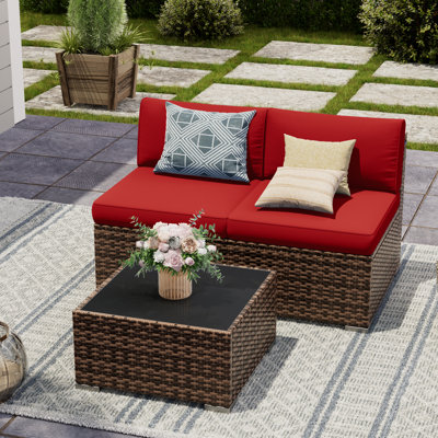 2 Piece Rattan Sectional Seating Group With Table