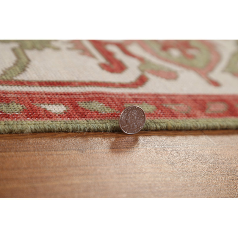 Tapis oriental en laine noué à la main