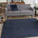 Mullican Sandy Solid Blue Easy Care Indoor/Outdoor Area Rug