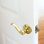 Levier de défilement à volute pour porte de passage