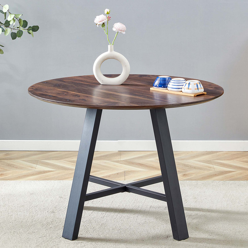 Table de salle à manger ronde et moderne avec plateau en panneau de fibres à densité moyenne et pieds en métal