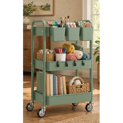 Organisez vos courses, vos fournitures de lessive ou vos articles de cuisine et de salle de bain sur un chariot en filet vert à 3 niveaux d'une capacité de 66 livres, avec des roues verrouillables, 3 tasses suspendues, 4 crochets et un assemblage facile