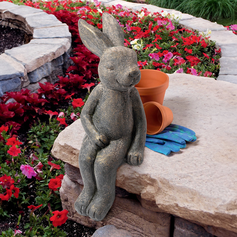 Statue lapin assis en lapin resida