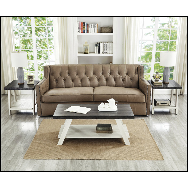 Table basse rectangulaire avec plateau en bois massif et manufacturé, parfaite pour un décor moderne et classique.