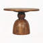 Table basse sur piédestal en bois sculpté