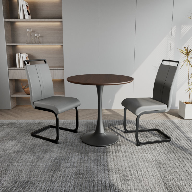 Ensemble de table de salle à manger 31,5 "en noyer circulaire, table à manger tulipe, table de salle à manger pour 2 à 4 personnes et 2 chaises de salle à manger en métal noir