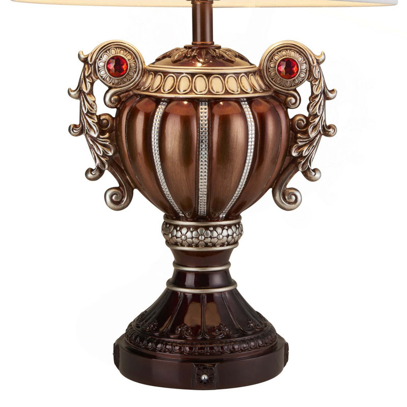 Lampe de table en polyrésine de forme trophée avec poignées à volutes, bronze