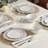 Tabletops Gallery Vintage 12 Piece Embossed Porcelain Dinnerware Set in White with Blue Stripes