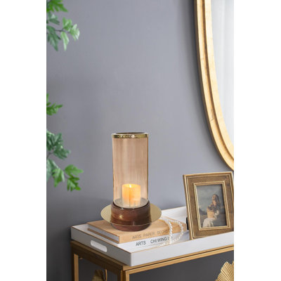 Petit porte-bougie en verre ambré D7x11
