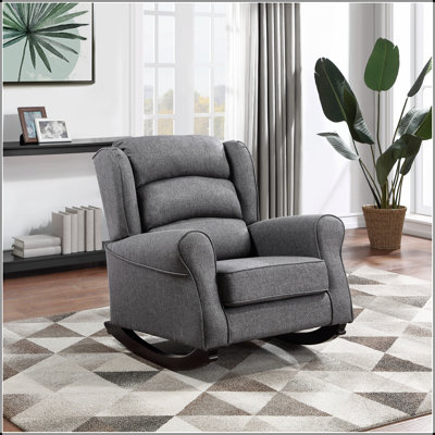 Chaise berçante grise avec accoudoirs évasés