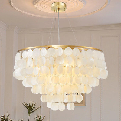 24 Inch Gold Shell Style Chandelier with Cascading Petal Accents for Soft Elegant Dining Living and Foyer Ambiance