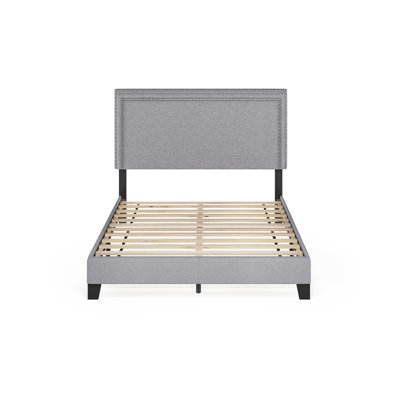 Carlester Upholstered Slat Bed