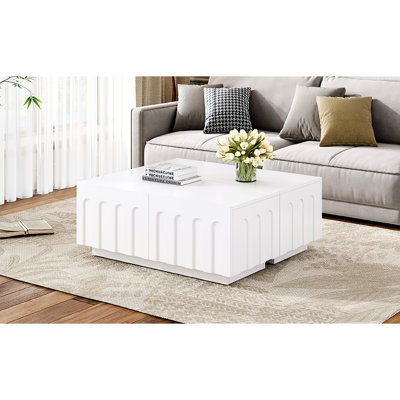 Élégante table basse blanche et meuble télé, quatre tiroirs spacieux pour organiser des articles de maison, conception arquée sur tiroir, confectionnée à partir d'un support, rangement des essentiels,