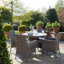 Dubose 4 - Person Wicker Patio Dining Set with Round Table , Cushions Included-969686495