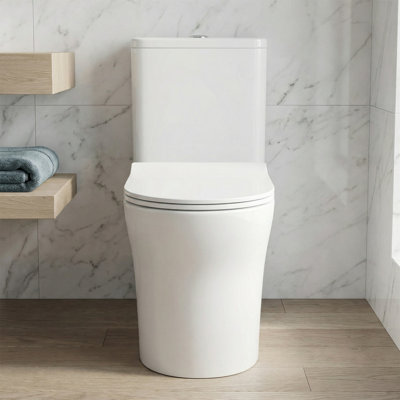 Toilette une pièce à double chasse - Toilette allongée au sol à hauteur de confort de 16,3 po, 1,1 / 1,6 GPF certifié WaterSense et CUPC, siège à fermeture douce, conception à jupe, céramique blanche avec trousse d'installation complète