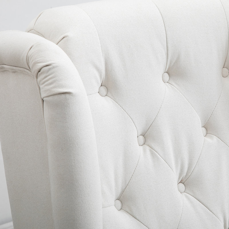 Siège élégant, blanc crème, rehaussant le décor de la pièce, fauteuil blanc crème avec capitonnage profond, pieds, pour la maison