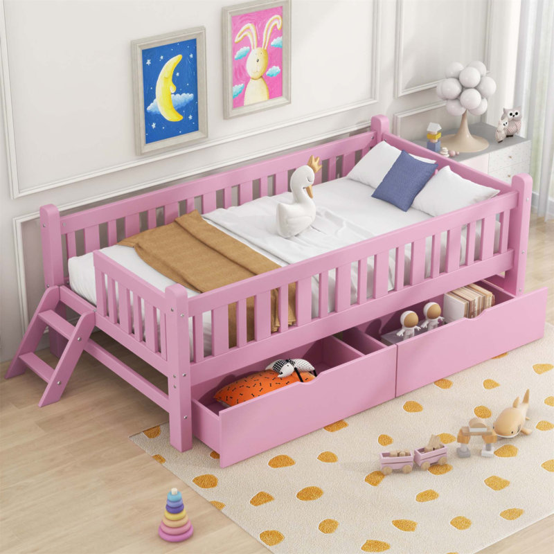 Lit plateforme pratique en bois avec garde-corps et deux tiroirs, offrant un jeu sécuritaire et un grand rangement pour les chambres d'enfants