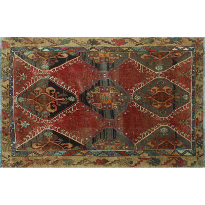 Tapis rouge semi-antique Kaz