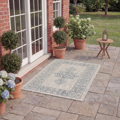 Arneshia Southwestern Aqua Indoor/Outdoor Area Rug
