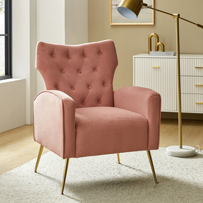 Fauteuil à oreilles en velours avec capitonnage à boutons H 37 "Consolata