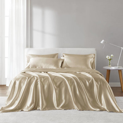Drap-housse en satin de luxe - Rides - Relaxation. Convient aux matelas jusqu'à 16 po. Comprend 1 drap plat et 4 taies d'oreiller. Soyeux et confortable. Champagne