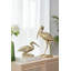 Figurine de grue agenouillée