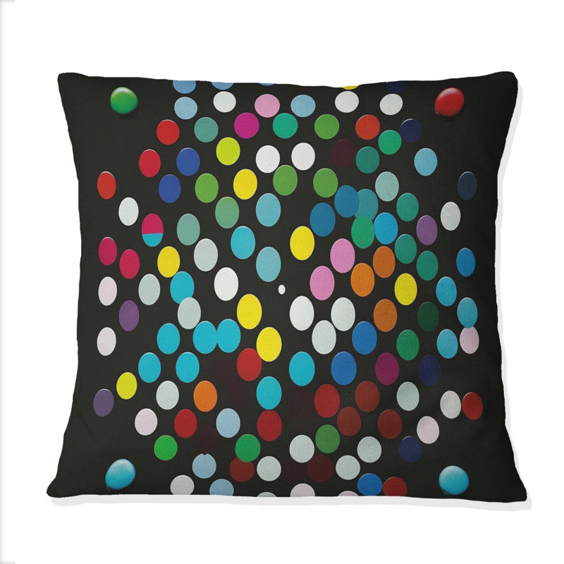 Coussin décoratif imprimé géométrique à code couleur sur fond noir