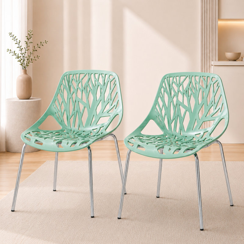 Chaises d'appoint empilables avec dossier à découpes florales et pieds en acier inoxydable - sièges de cuisine, de restaurant ou de banquet modernes