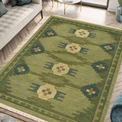 Tapis vert olive à losanges