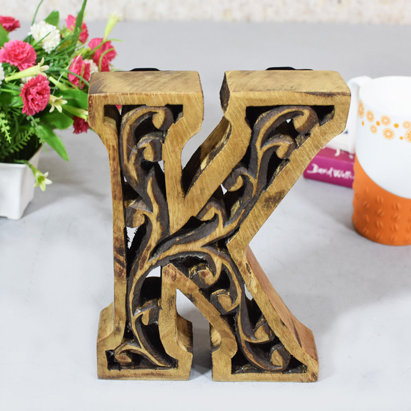 Alphabet écologique, K, Brun héritage sculpté