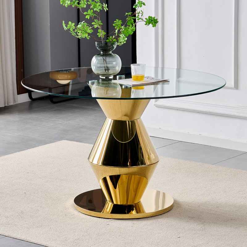 Table de salle à manger ronde de 47,25 pouces de style moderne avec finition miroir dorée, pouvant accueillir 4 à 6 personnes, plateau de table en verre trempé, structure en acier inoxydable.