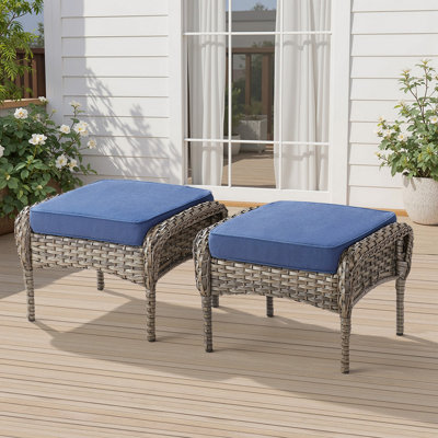 Ensemble de 2 repose-pieds d'extérieur en rotin gris avec coussin bleu pour cour ou terrasse