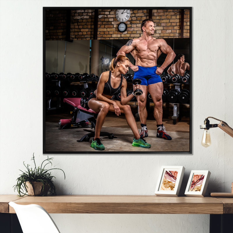 Sports Couple Is Work Out Gym sur impression sur toile, H 16 po x l 16 po x P 1 po, Cadre flottant noir