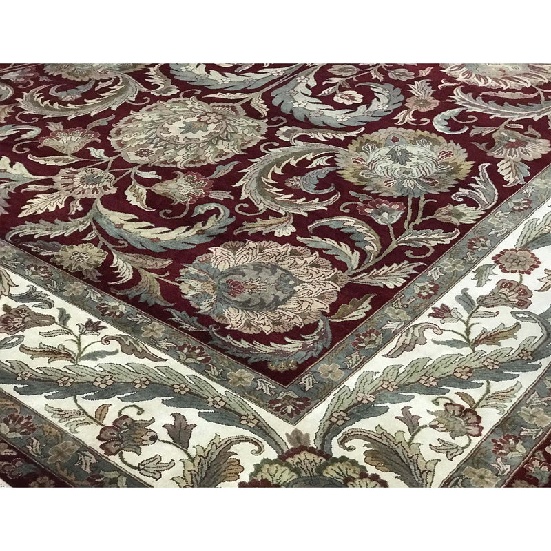 Tapis rouge et ivoire noué à la main de haute qualité