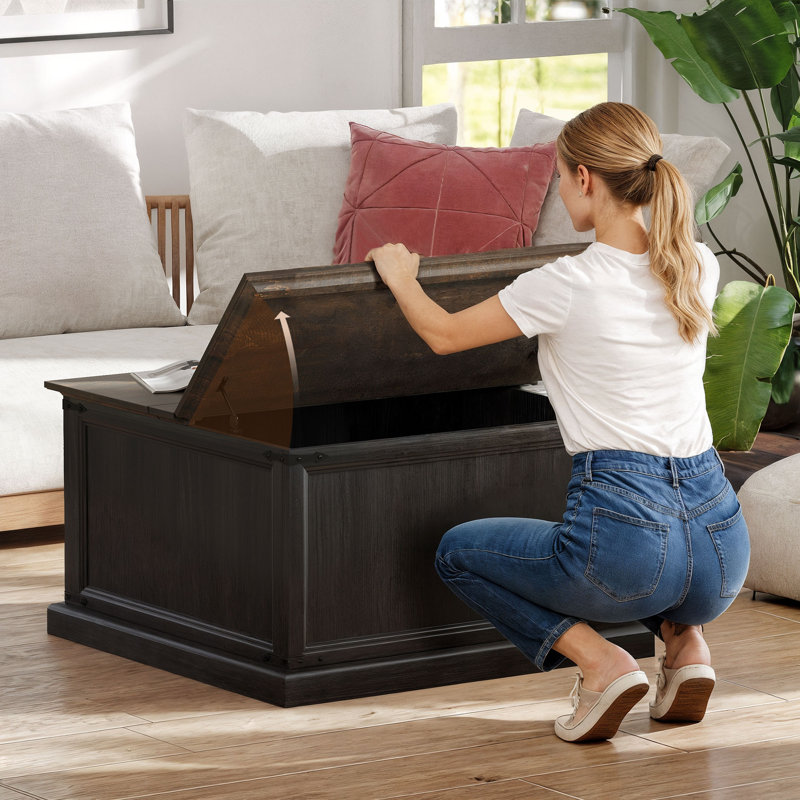 Table basse à plateau relevable avec station de charge et rangement, noir