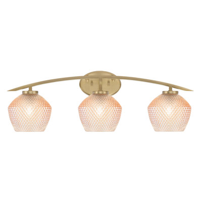 Kurve 3 Light Bath Bar Shown In New Age Brass Finish With 6" Amber Textured Glass
