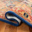 Tapis bleu / rouge / brun en laine touffeté à la main Colyt-853221663
