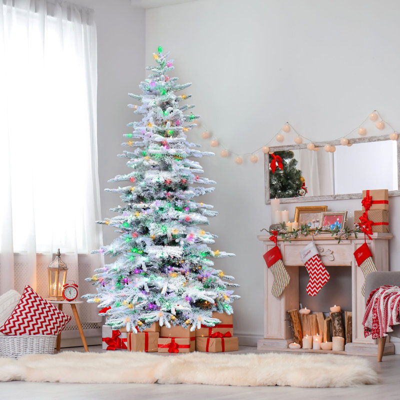 9-Foot Flocked Pine Christmas Tree with Multicolor LED Lights