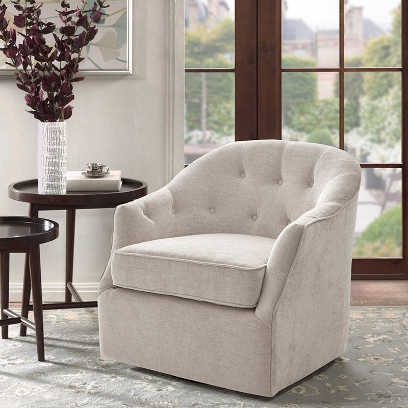 Fauteuil d'appoint courbé et capitonné