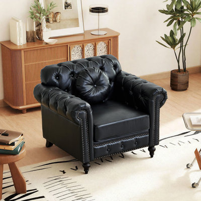 Chaise d'appoint en similicuir avec coussin