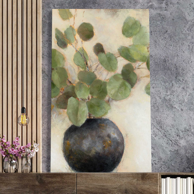 "Feuilles d'eucalyptus dans un vase noir (vertical)" par Lanie Loreth, reproduction sur toile, L 28 po x H 48 po x P 1,5 po