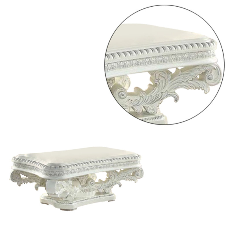 Kin 55" White Ornate Wood Coffee Table with Scrolled Pedestal