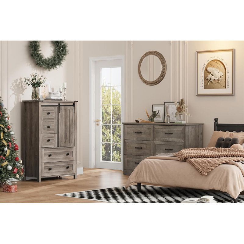 Porte de grange coulissante: cette commode à 5 tiroirs comporte une porte de grange coulissante rustique sur une voie lisse, alliant l'esthétique de la maison de campagne à une fonctionnalité moderne pour fournir un rangement élégant et un accès fa