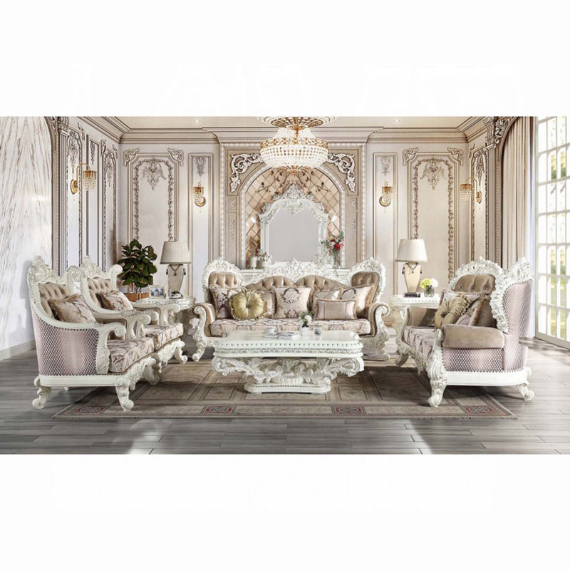 Antique White Tufted Sofa with Floral Cushions and Nailhead Trim