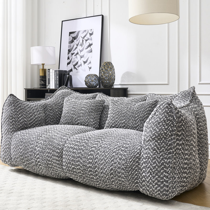 Fauteuil douillet pour jouer, lire, regarder la télévision en intérieur. Deux places avec un noyau en mousse confortable pour une relaxation optimale.